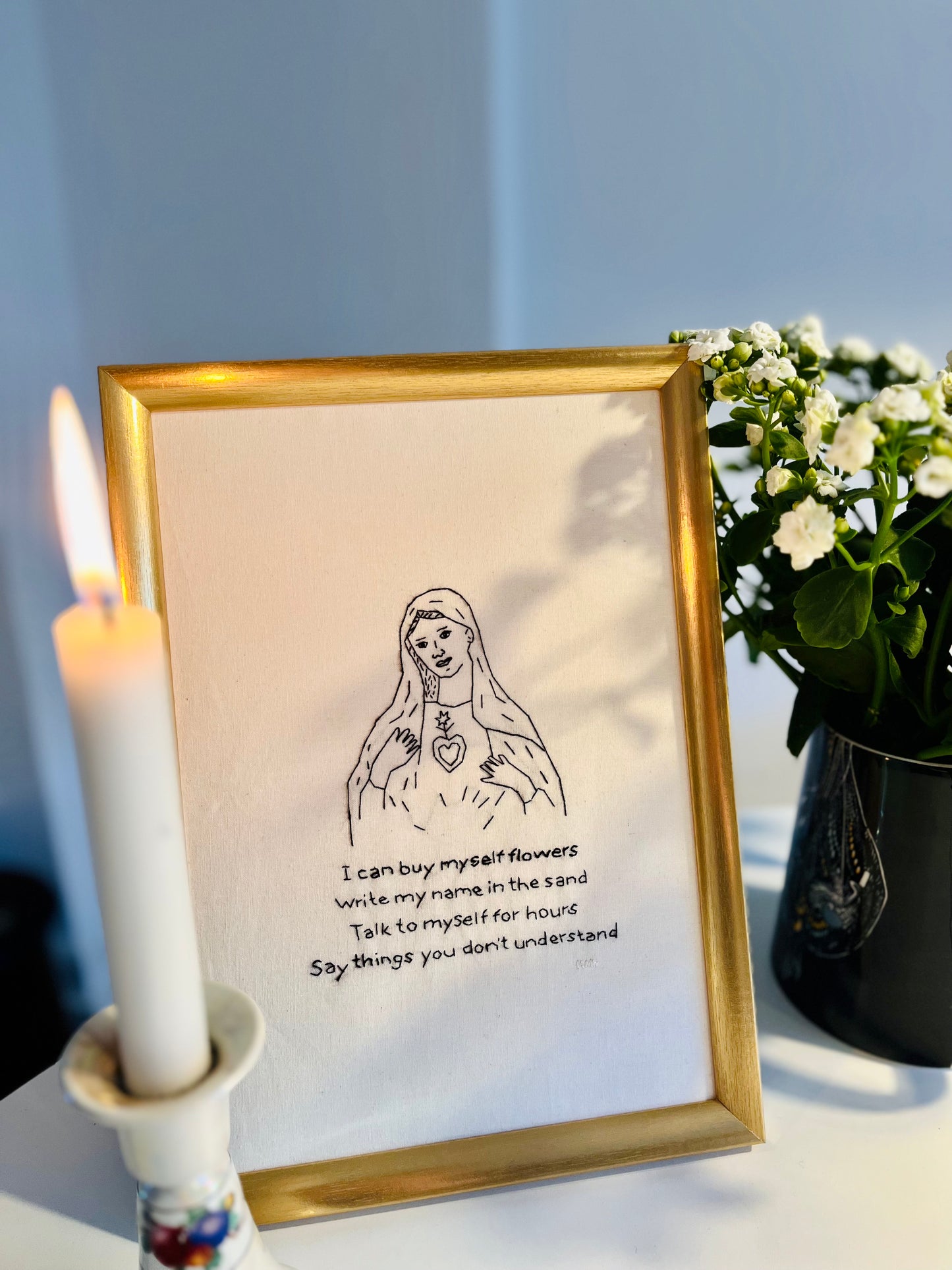 Jomfru Maria kan købe sine egne blomster