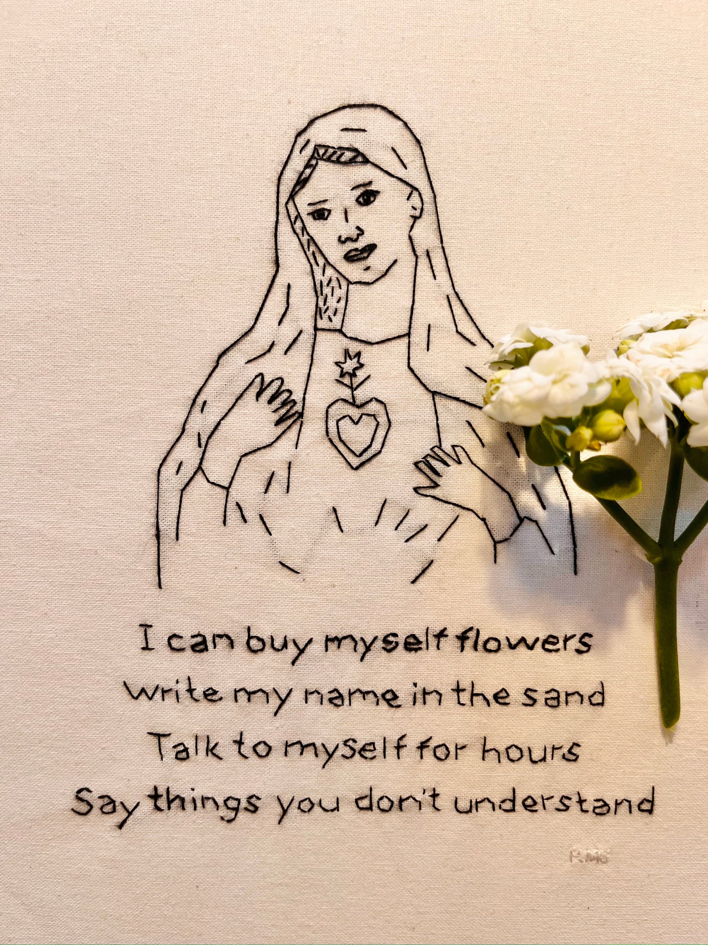 Jomfru Maria kan købe sine egne blomster